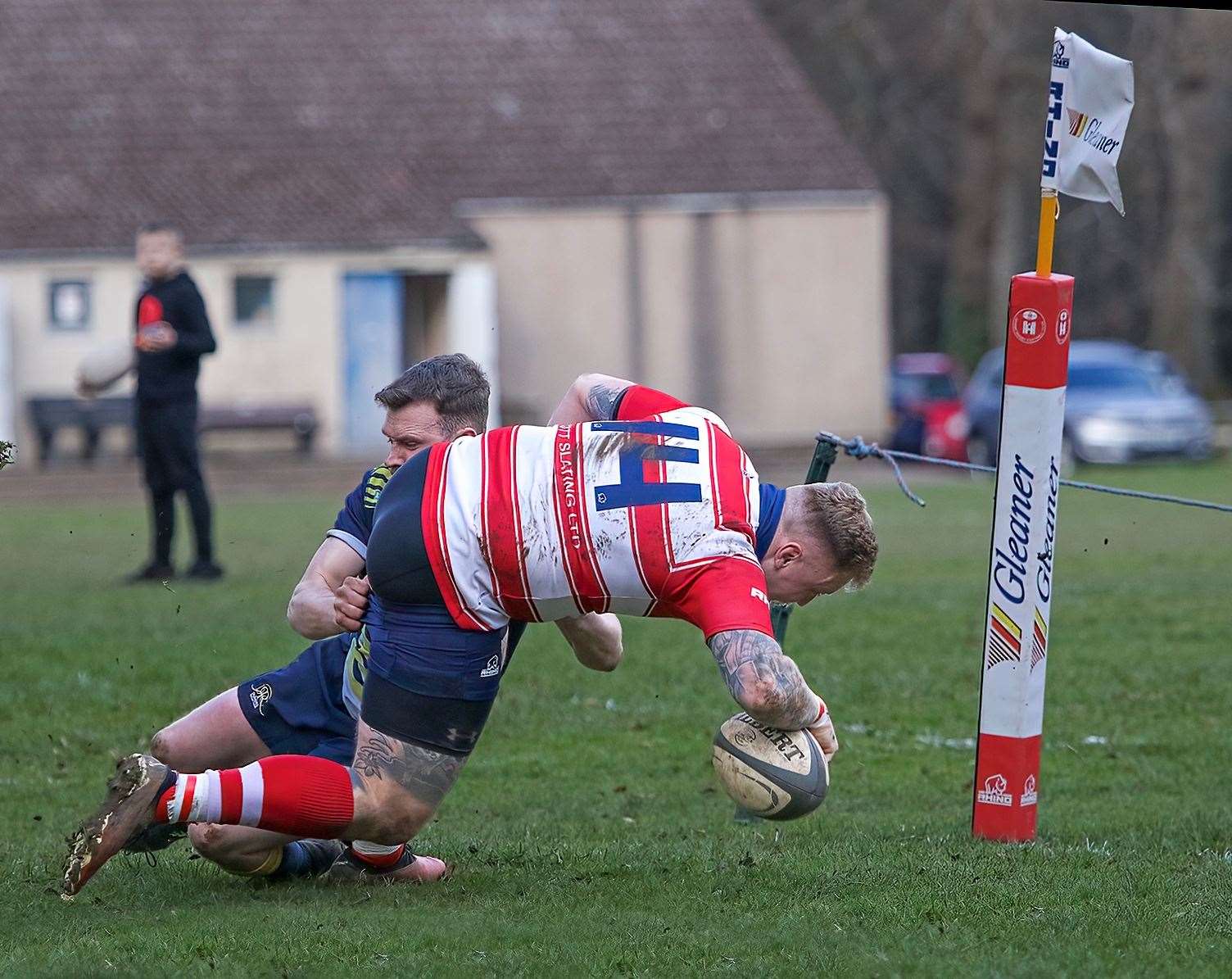 Lewis Scott gets tackled by his opposite number. Picture: John MacGregor
