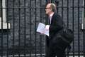 Cummings pictured in Downing Street with archive document on defence