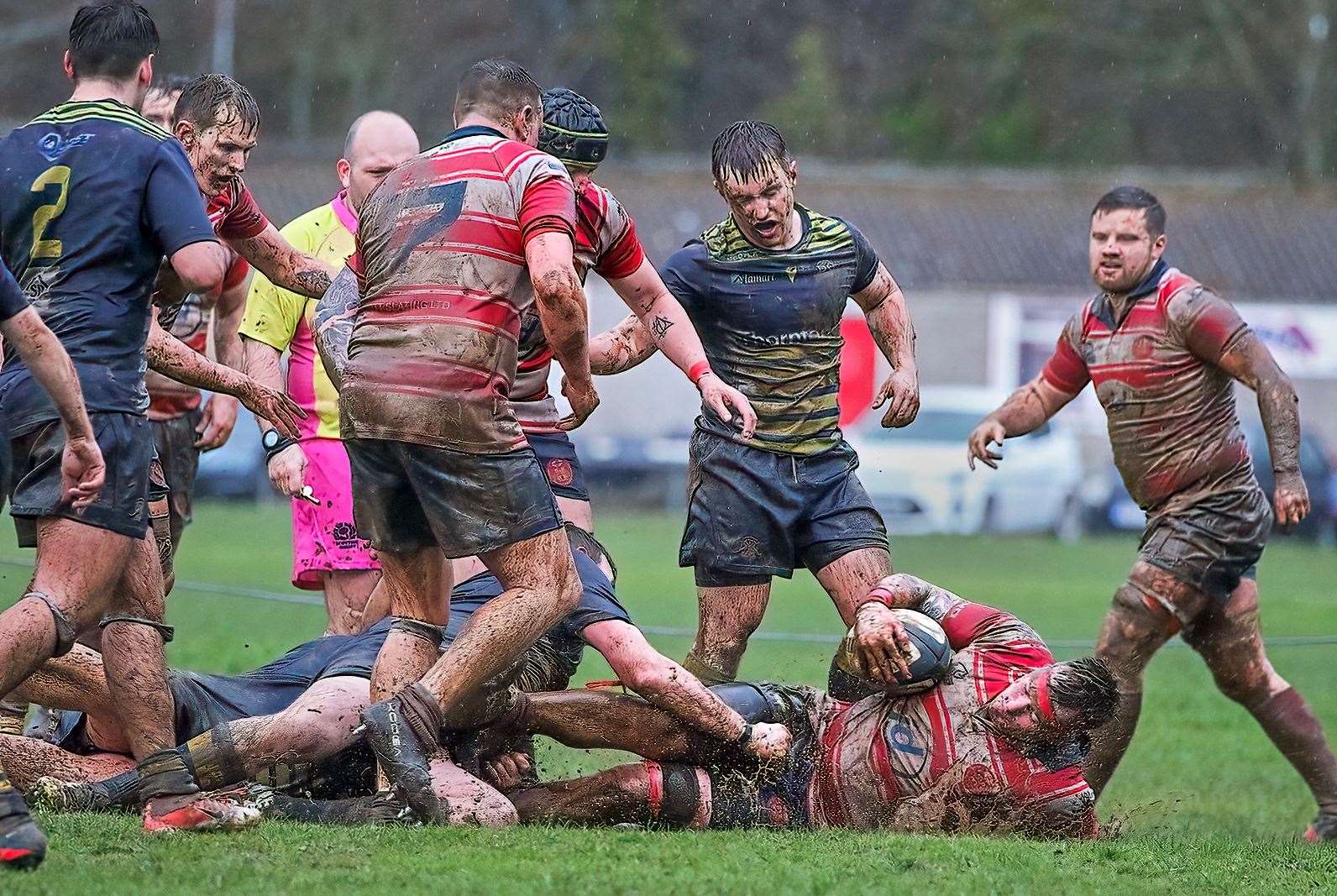 Hugh MacRae goes to ground to set the ruck. Picture: John MacGregor