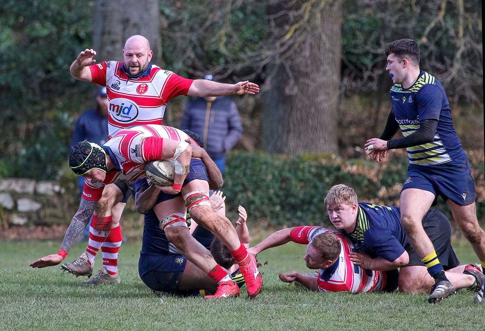 Alex Matthews is tackled. Marc Higgins coming to support. Picture: John MacGregor