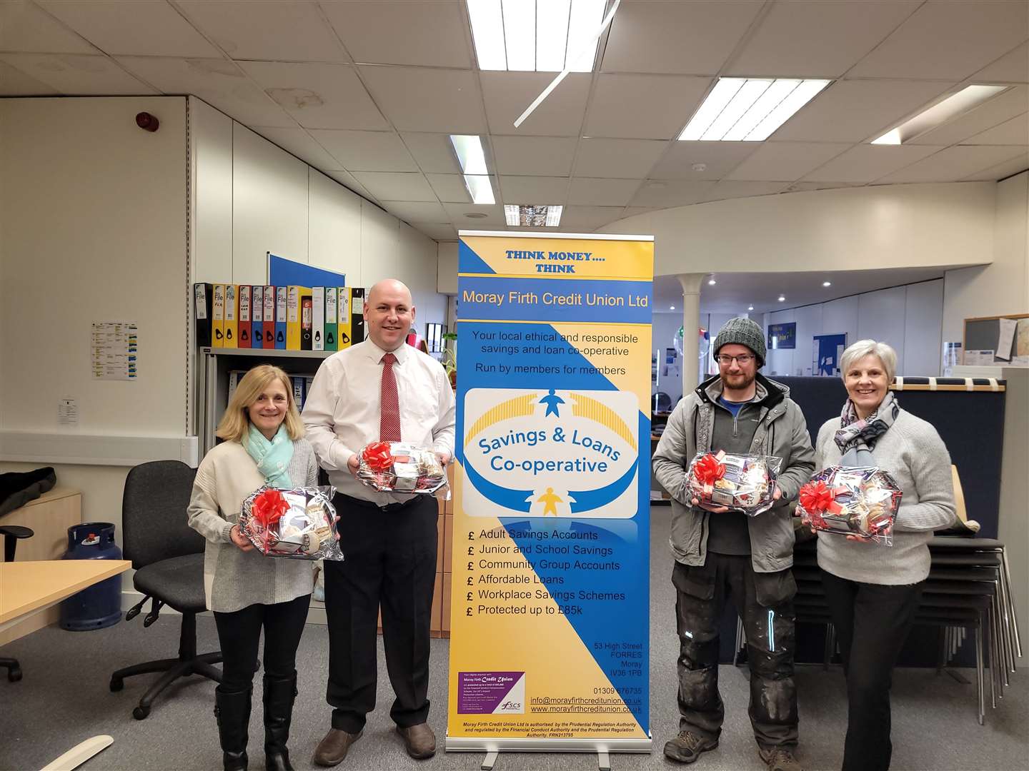 Jackie Nicol, Shaun Moat, Duncan MacKinnon and Jackie Douglas helped distribute the hampers from Moray Firth Credit Union.