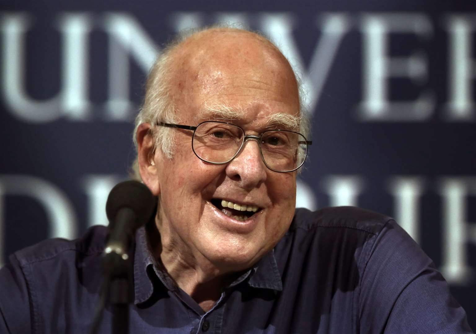 Prof Higgs speaking to the media at a press conference in Edinburgh after being awarded the Nobel Prize for Physics in 2013 (David Cheskin/PA)