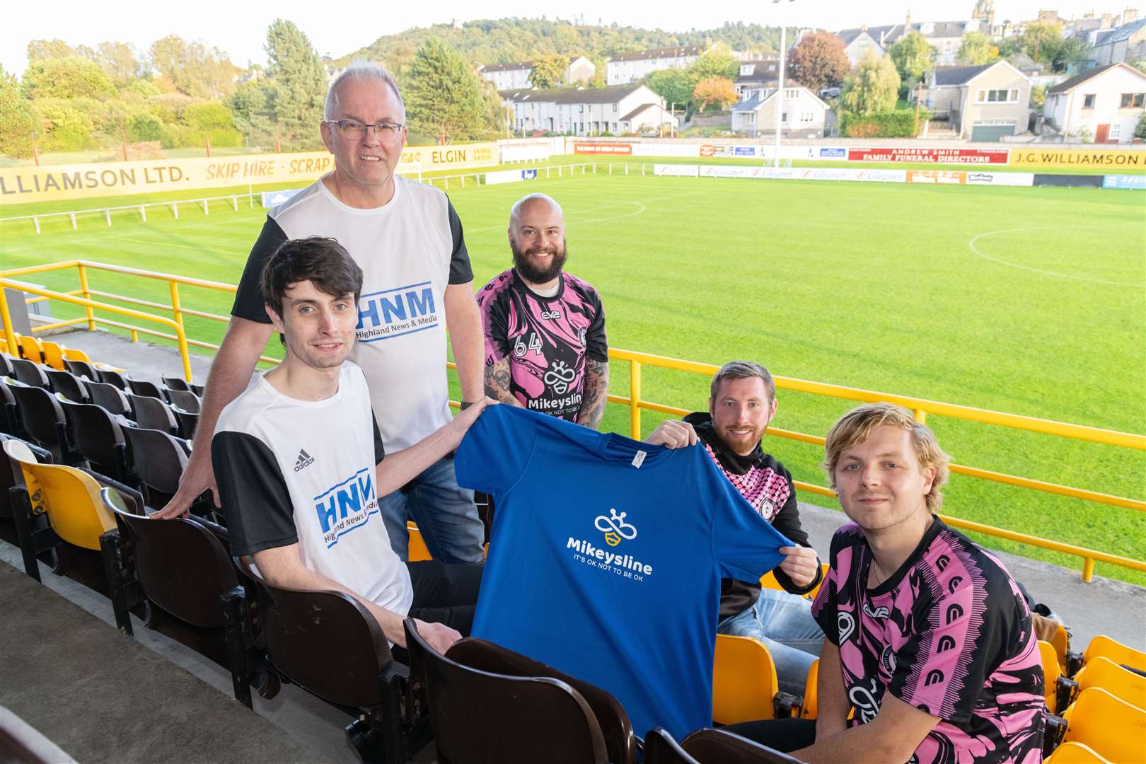 From left: Jonny Clark, Chris Saunderson from The Northern Scot with Matty Slinger, Steven Simpson and Phil Barton from Moray Mental Health Football Club ahead of the Mikeysline Cup charity match at Mosset Park. Picture: Beth Taylor