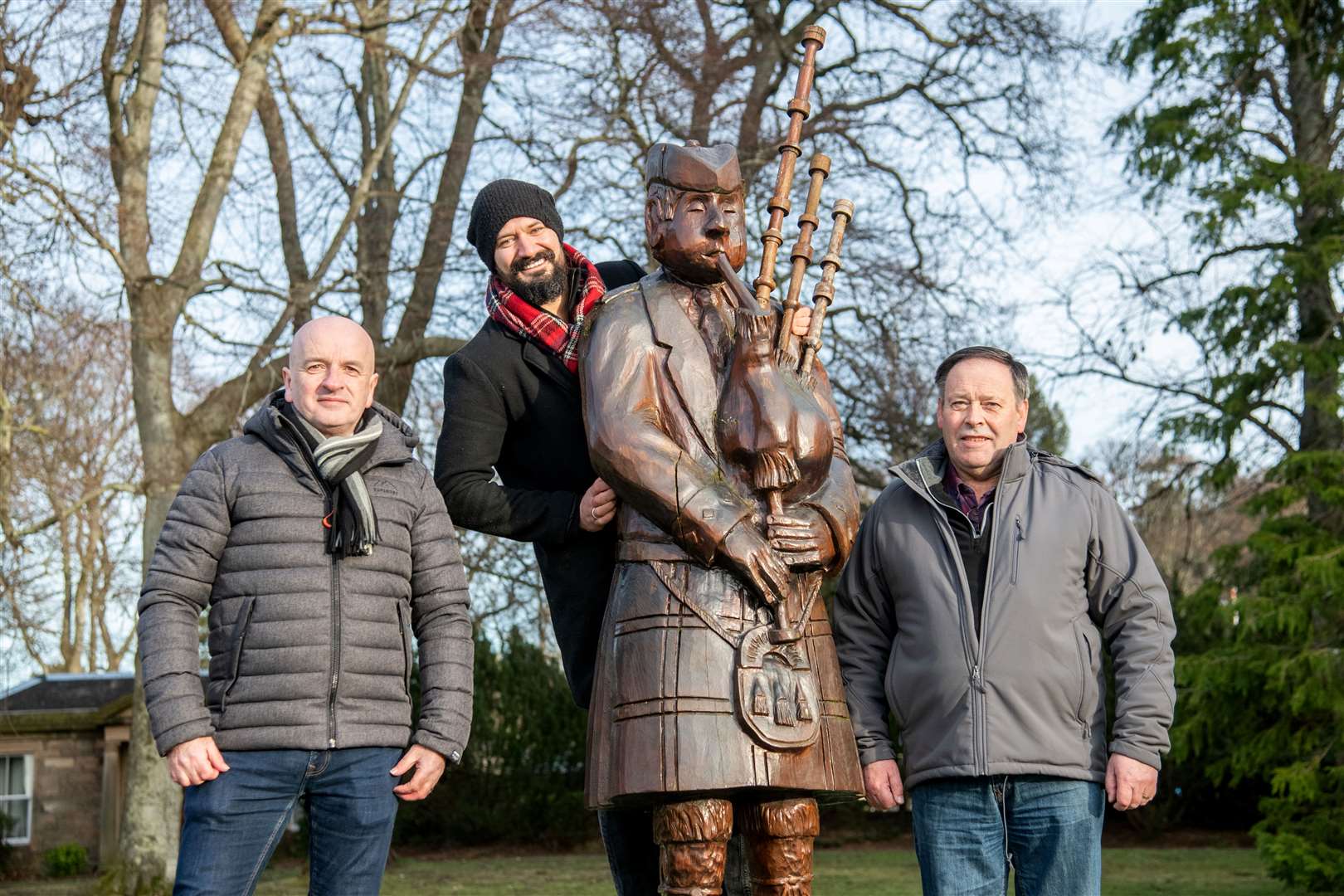 Andy MacDonald (centre) is joined by Royal Scottish Pipe Band Association's CEO Colin Mulhern (left) and director Bob Niven (right). Picture: Daniel Forsyth