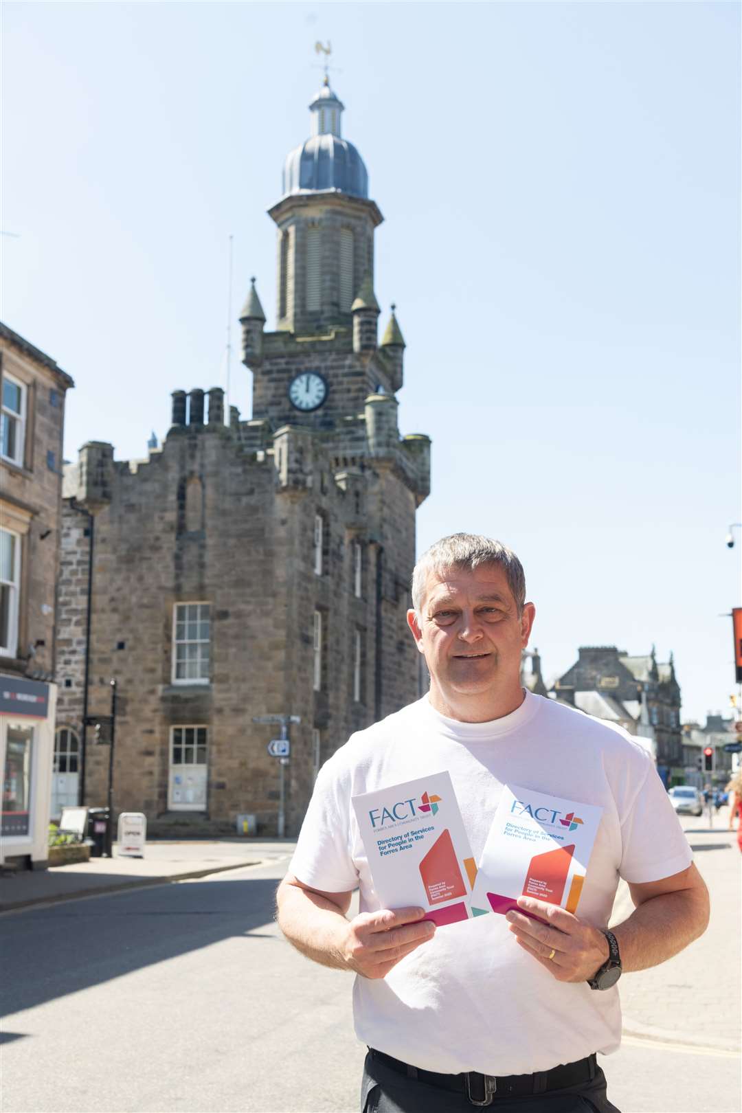 Forres Area Community Trust operations manager Nick Clark showing off the new local guide. Picture: Beth Taylor