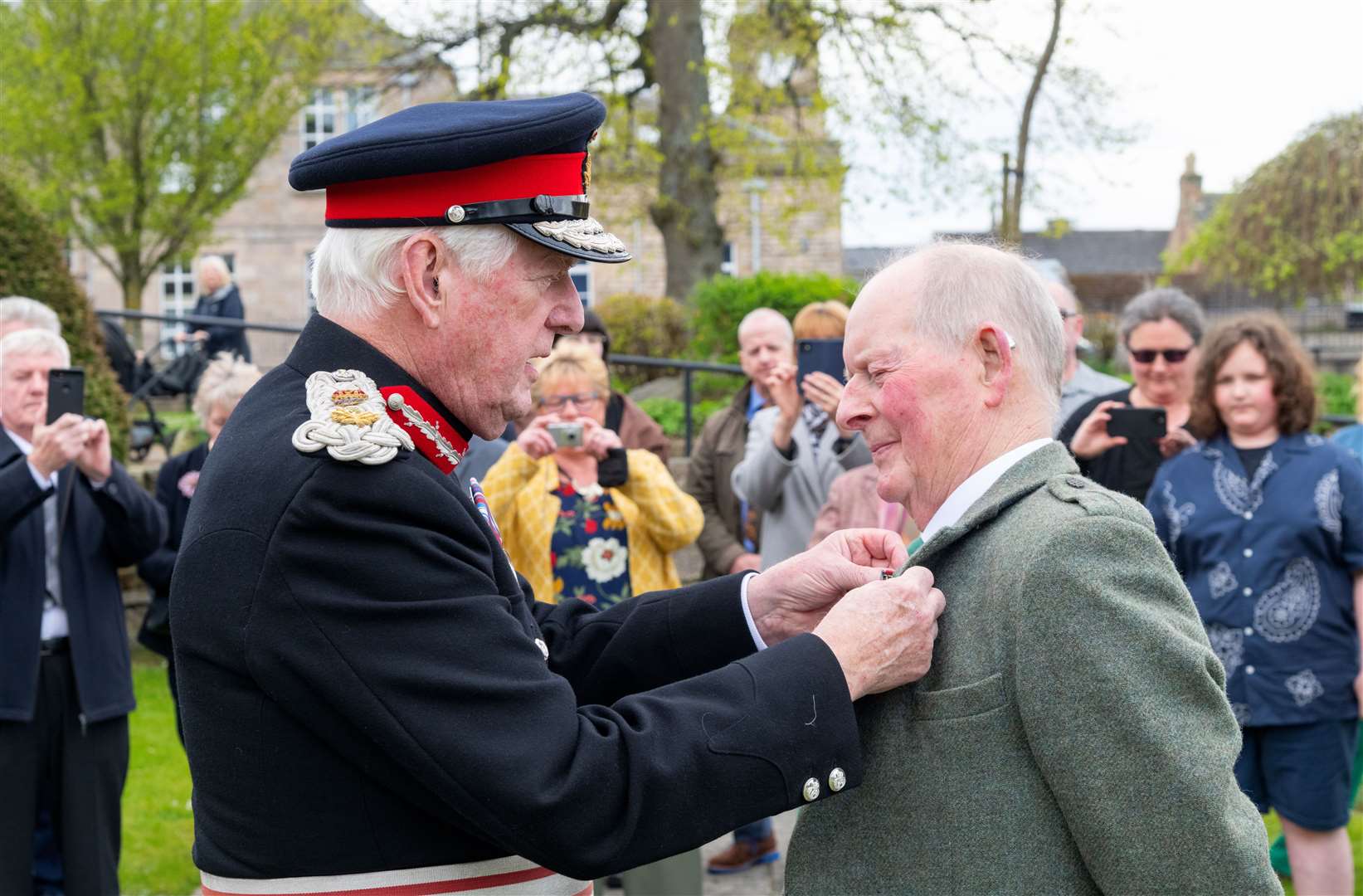 John MacKintosh being presented with his British Empire Medal from Lord Lieutenant of Moray, Seymour Monro. Picture: Beth Taylor