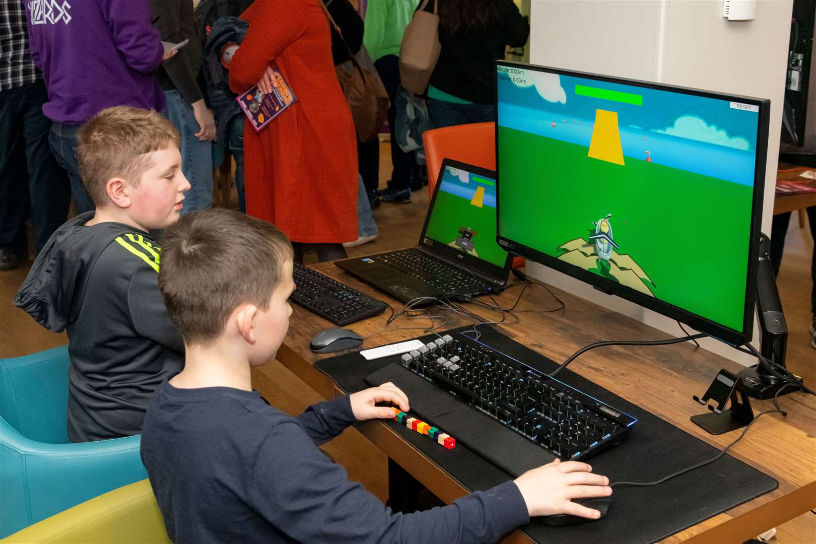 Members of the public enjoying Wing It at the Moray Game Jam 2024 with the theme Up Up and Away held at UHI Moray, in the Beechtree Restaurant. Picture: Beth Taylor