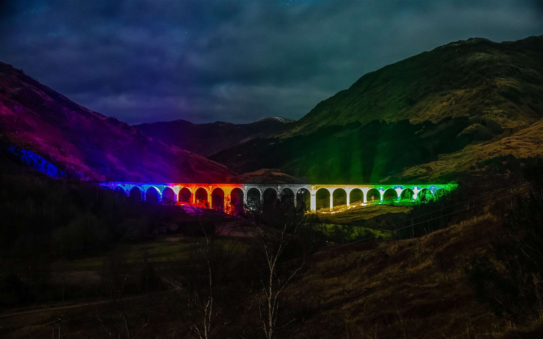 Glenfinnan Viaduct lit up.