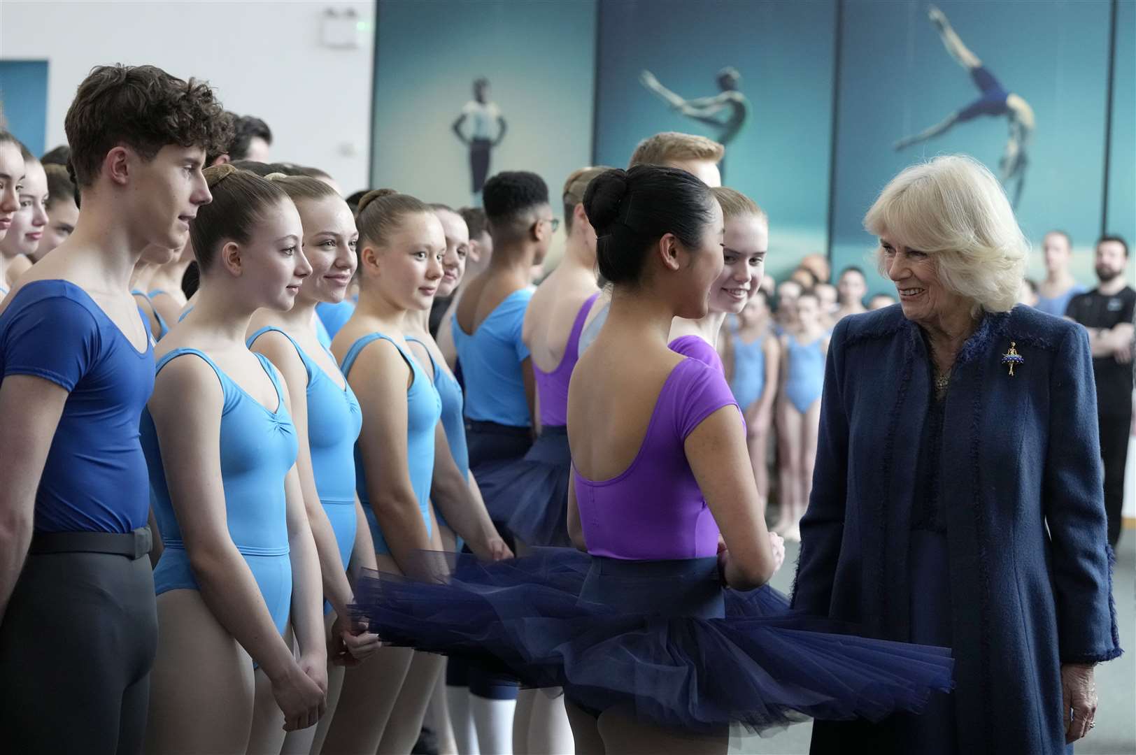 The Queen Consort met students during a visit to the Elmhurst Ballet School in Birmingham, of which she is patron, to celebrate its centenary (Frank Augstein/PA)