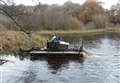 Work under way to clear weeds from Forres pond