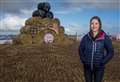 Young farmers plough on through rain to unveil bale art