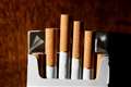 Legal age for smoking should rise and ‘polluter tax’ must be considered – report