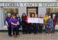 Shop staff raise £8000 for cancer charities