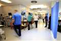 Norovirus cases fall though NHS faces ‘sustained pressure’