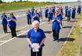 Sea of blue send-off on carer's retirement