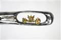Sculptor creates tiny royal coach in the eye of a needle as Jubilee tribute