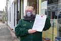 Shop owner hits out over face mask claim