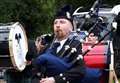 Reunited: Forres piper plays at emotional gathering