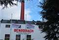 Flags at half-mast outside Benromach for Forres brewer