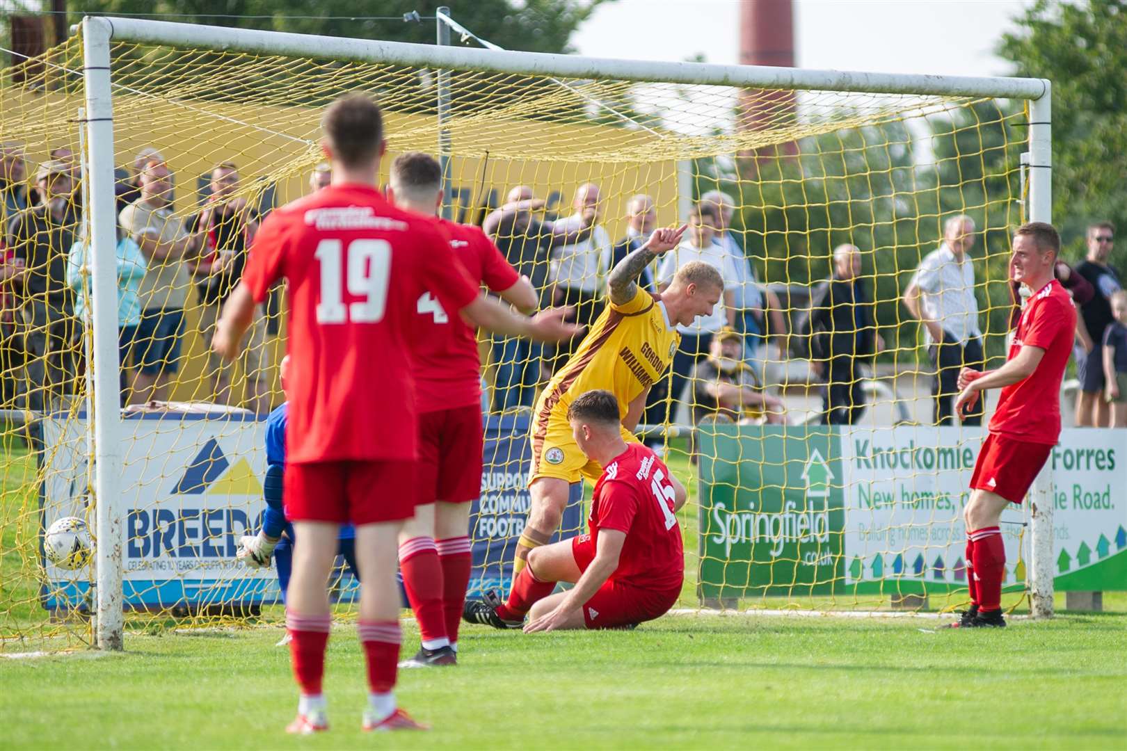 Forres frontman Lee Fraser pokes the ball home from close range scoring the only goal of the afternoon. ..Forres Mechanics FC (1) vs Lossiemouth FC (0) - Highland Football League - Mosset Park, Forres 28/08/2021...Picture: Daniel Forsyth..