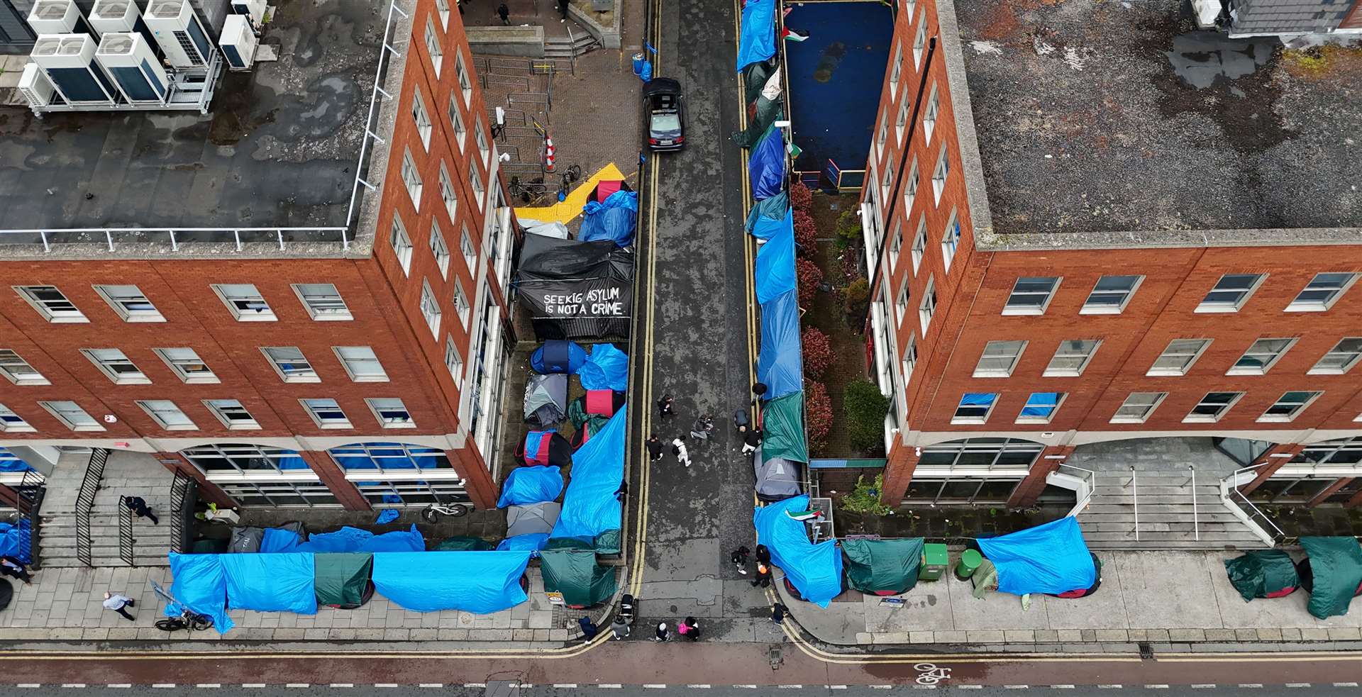 Tents housing asylum seekers near to the Office of International Protection, in Dublin (Niall Carson/PA)