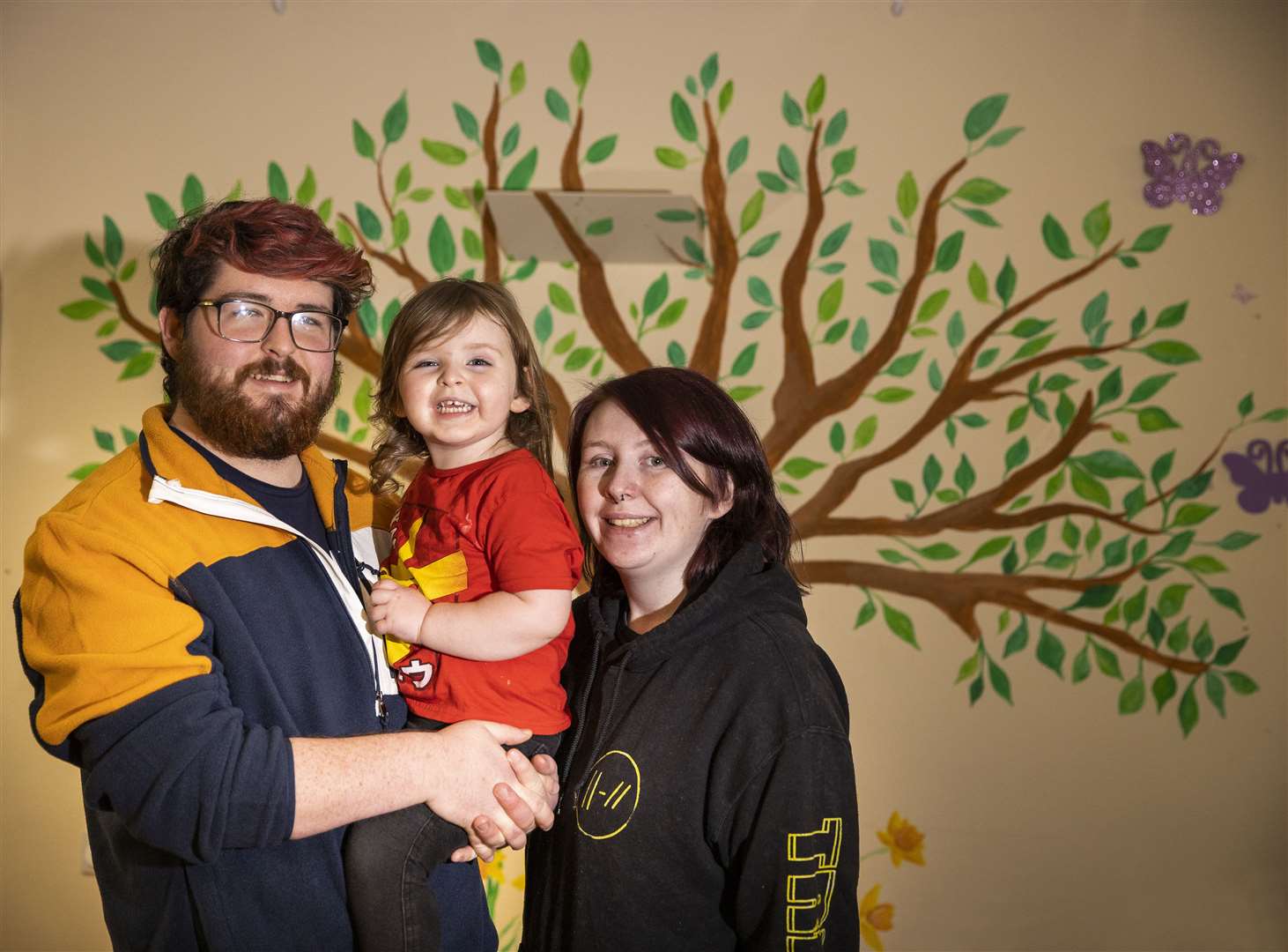 River Shannon, John McLaughlin and their daughter Robin, two, who are living in a hostel in Belfast (Centre for Homelessness Impact/Liam McBurney/PA)