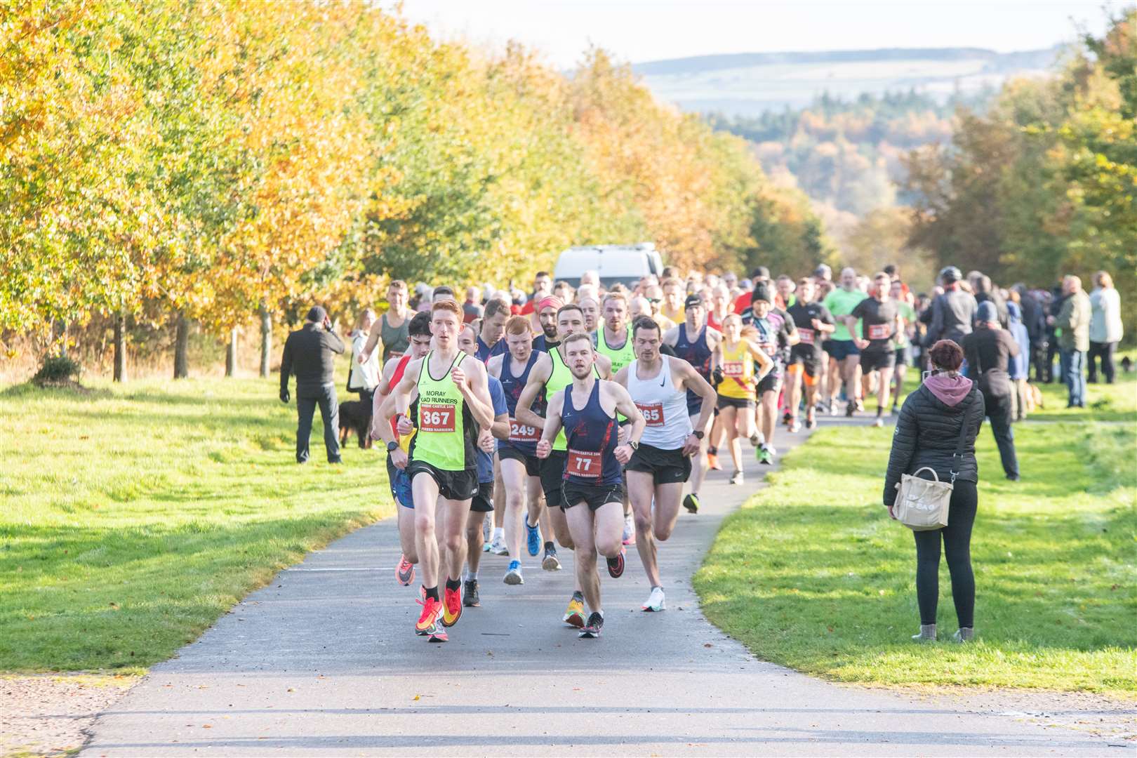 Runners set off at the start of the race...Forres Harriers' organised Brodie Castle 10k Race 2023...Picture: Daniel Forsyth..