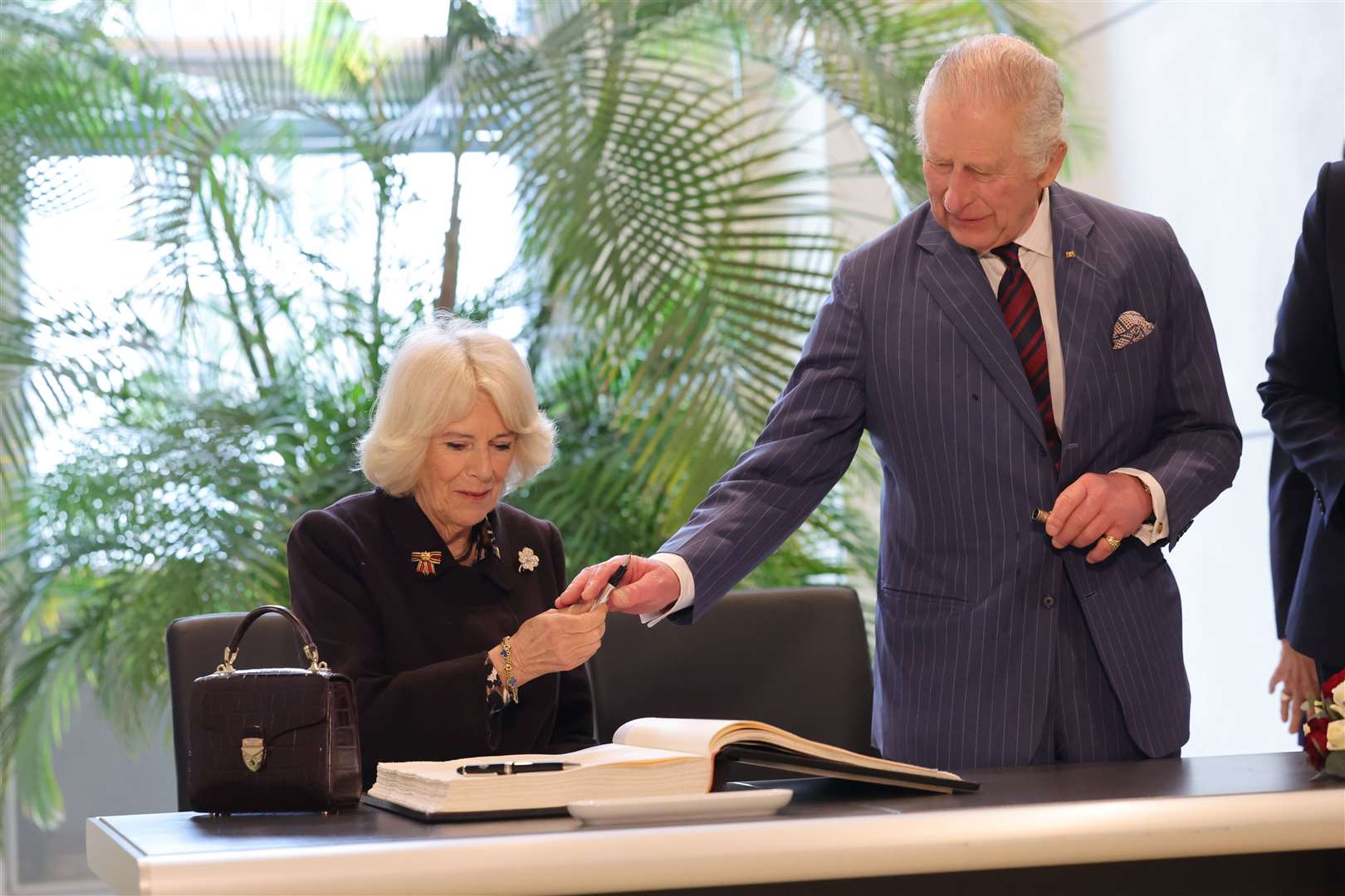 Charles and Camilla signed the Bundestag’s visitor’s book (Chris Jackson/PA)