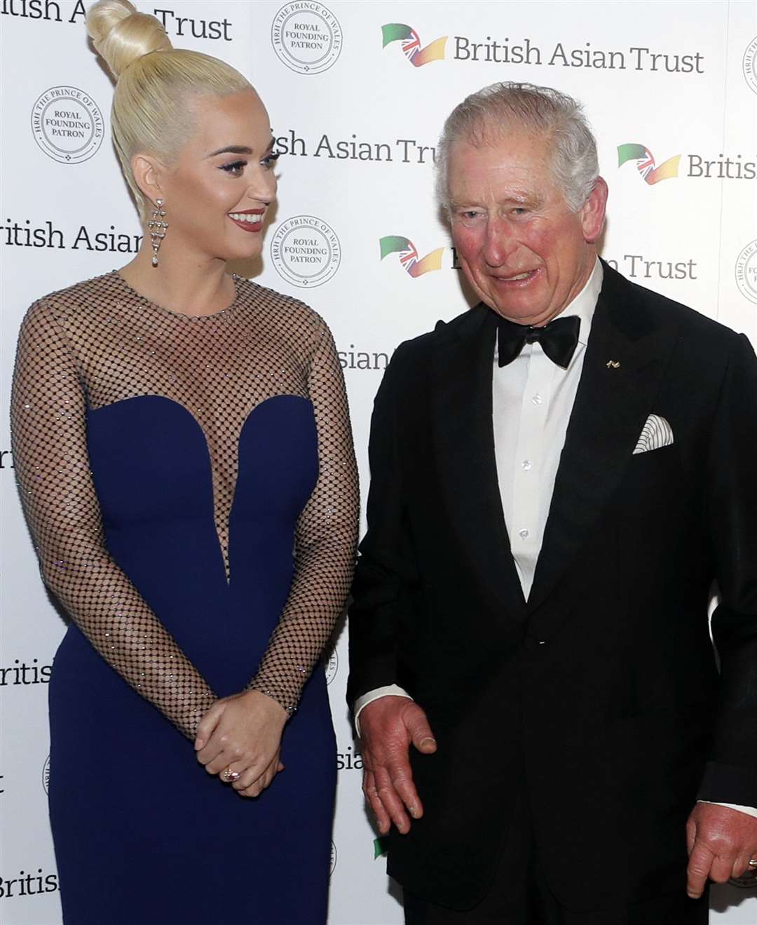 The then Prince of Wales with Katy Perry (Kirsty Wigglesworth/PA)