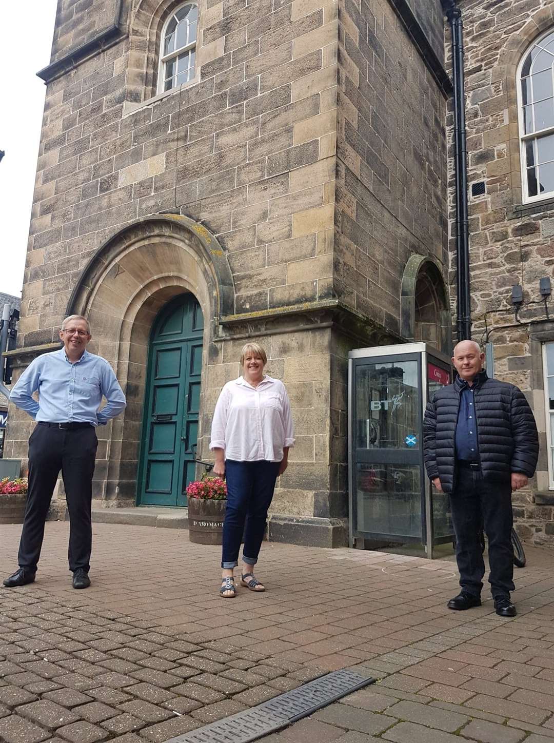 Steve Ferris, Jo Lenihan and John Innes outside the Tolbooth, the traditional home of Forres Community Council.