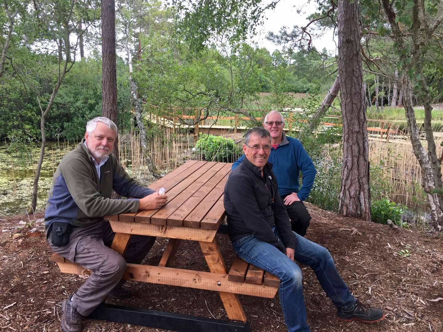 Friends of Blairs Loch Brian Higgs, Carlo Miele and Mike Sutherland at the picnic table.