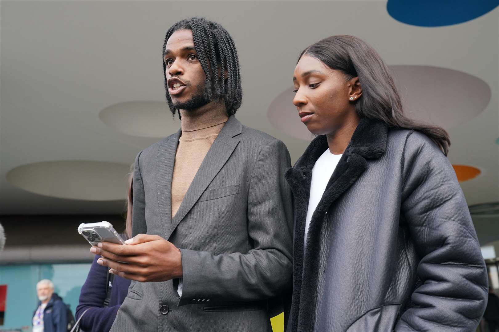 Athletes Bianca Williams and Ricardo Dos Santos speak to the media outside Palestra House, central London, after the judgement was given for the gross misconduct hearing of five Metropolitan Police officers over their stop and search (Jonathan Brady/PA)