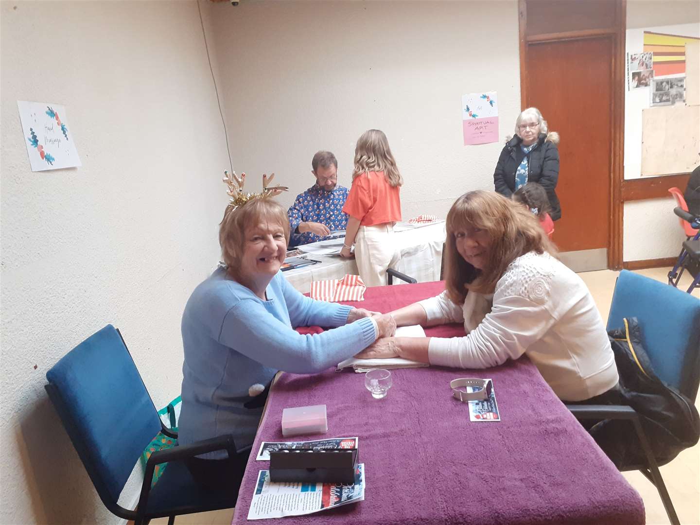 Forres Community Church volunteers gave free hand massages while accompanying Santa's grotto.