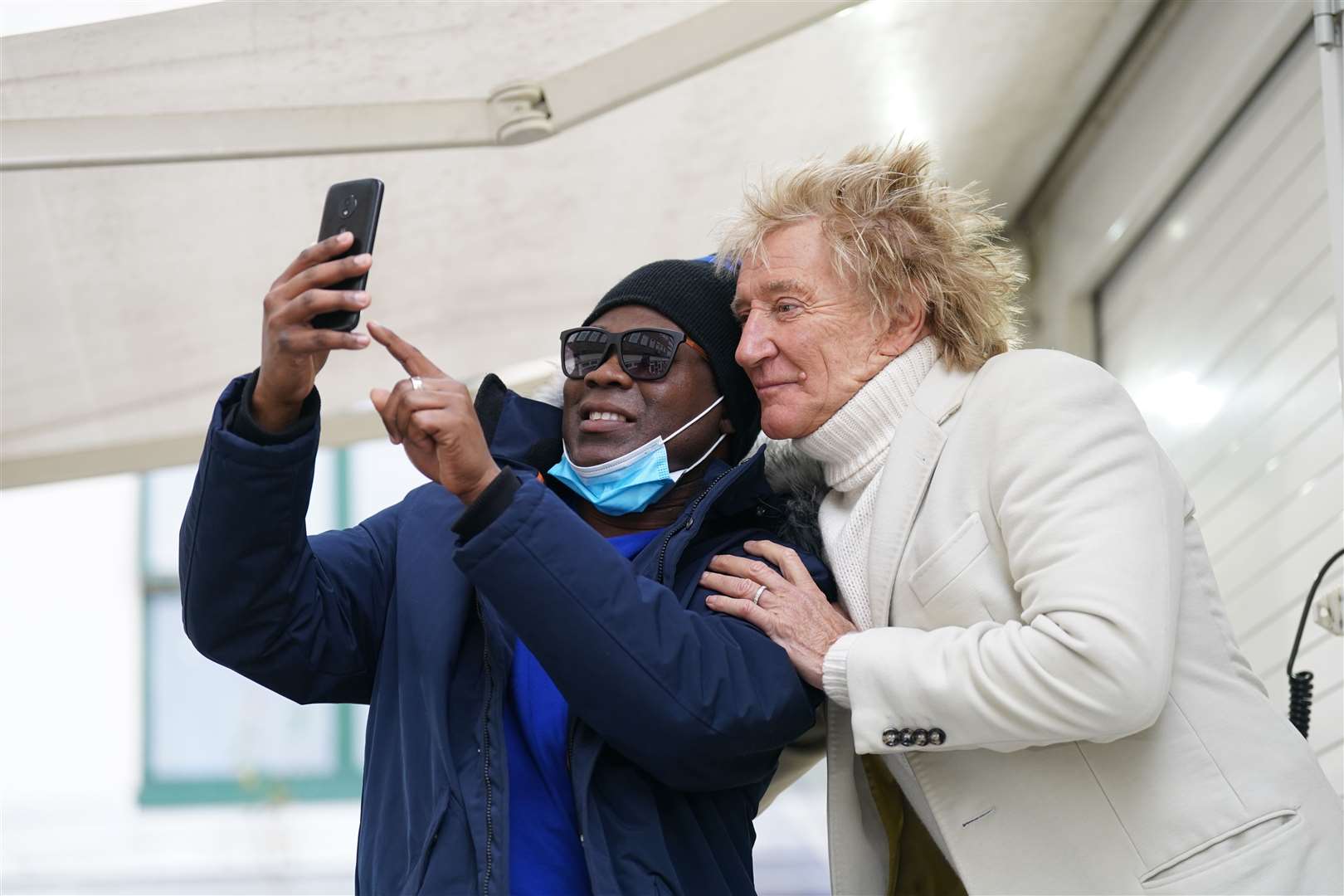 Sir Rod Stewart takes a selfie with Omarie Ryan, who received an MRI scan on his left knee (Joe Giddens/PA)