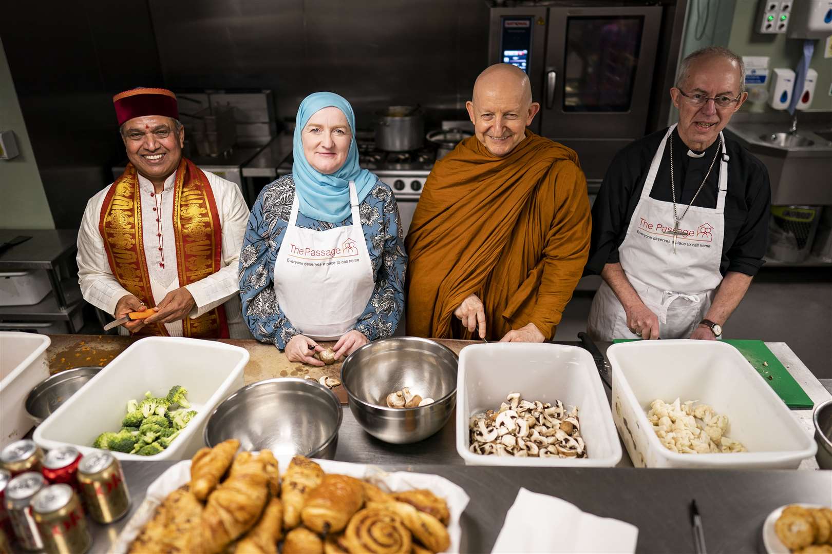 Krishan Kant Attri, Julie Siddiqi, Venerable Ajahn Amaro and the Archbishop of Canterbury Justin Welby taking part in the Big Help Out which aims to inspire a new generation of volunteers (Aaron Chown/PA)