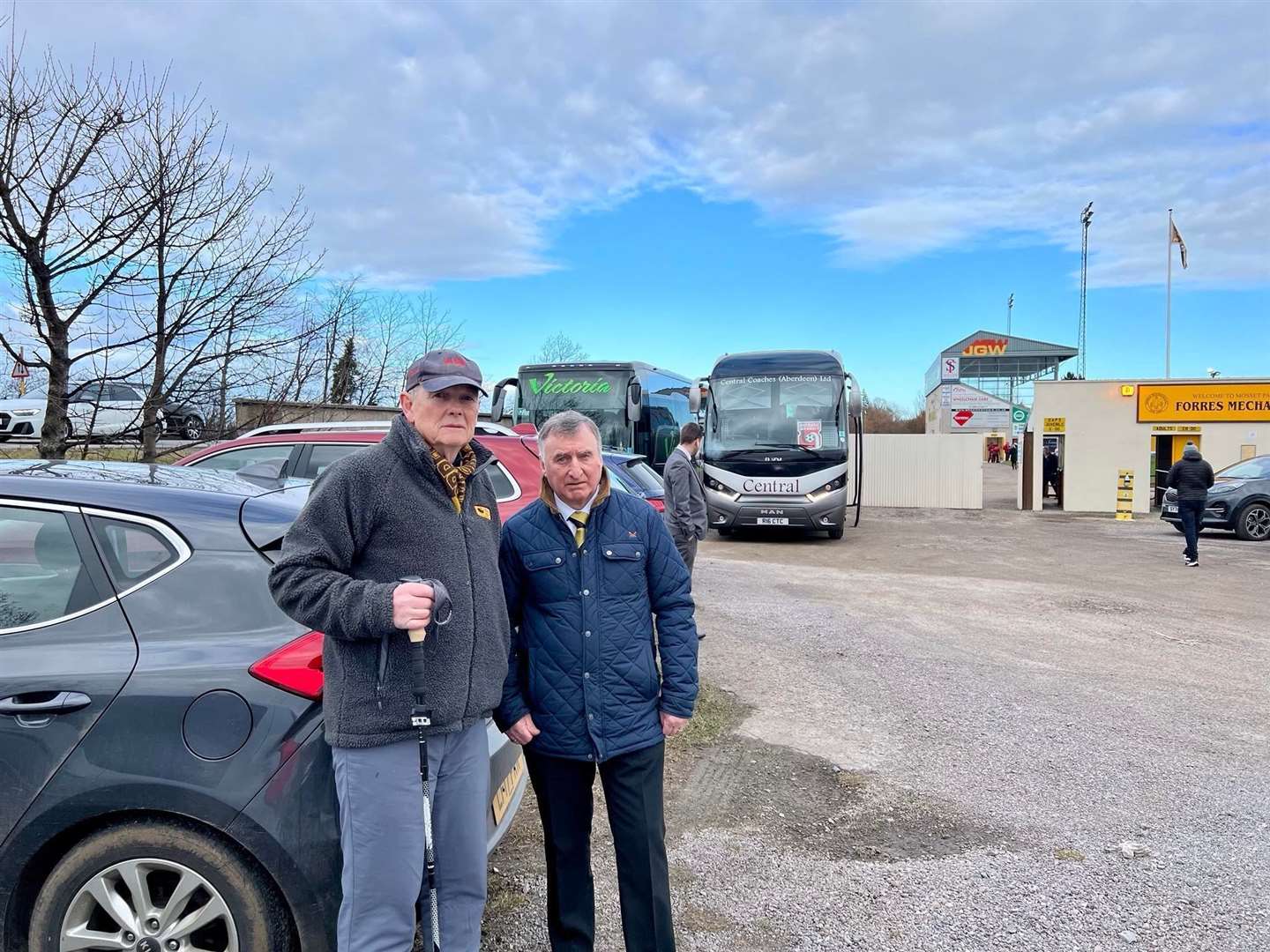 Don Wright (left) is joined by Forres Mechanics chairman outside Mosset Park ahead of Forres' home game against Inverurie Locos.