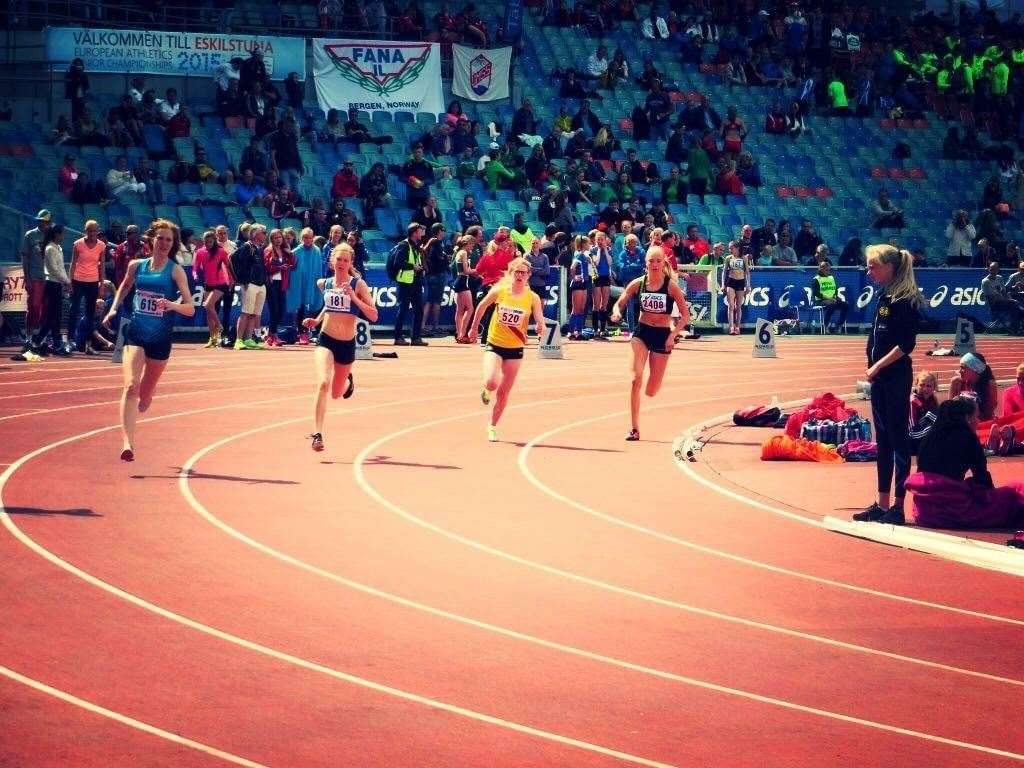 Lucy Massie (in yellow) in running action in Norway back in 2015.
