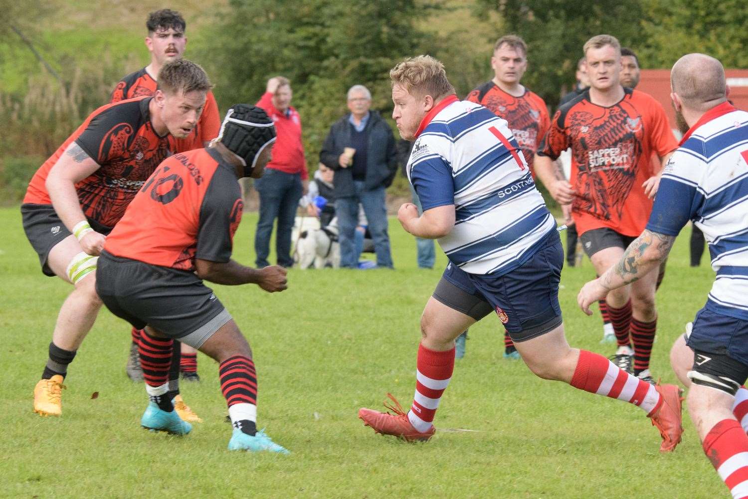 Prop Sam Fletcher-Harrison running at the Kinloss Eagles defence. Picture: Colin James Little