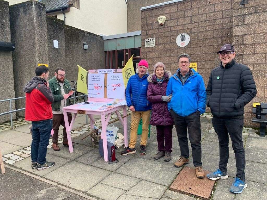 The pink table and canvassers including Simon Clark and Allan Gray.
