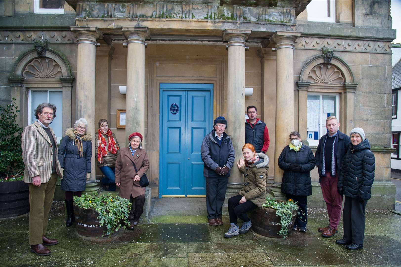 Committee members and Friends of the Falconer Museum, including chairman Dr John Barrett (left) locked outside of the closed museum. Picture: Becky Saunderson.