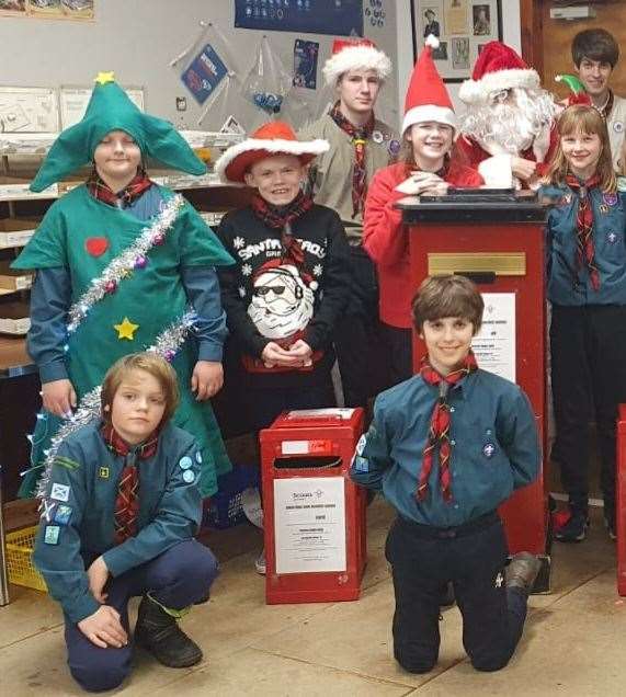 Some of the 1st Forres Scout postal workforce raring to start delivering Christmas cheer.