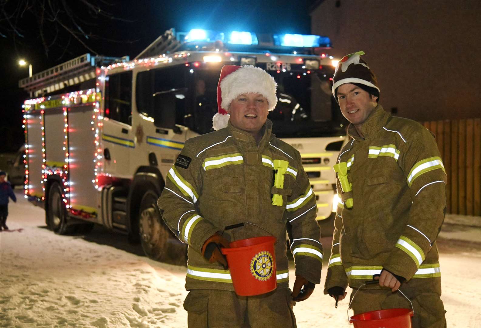 Firefighters Stewart Fraser and Harry Gilbert collecting donations. Picture: Beth Taylor