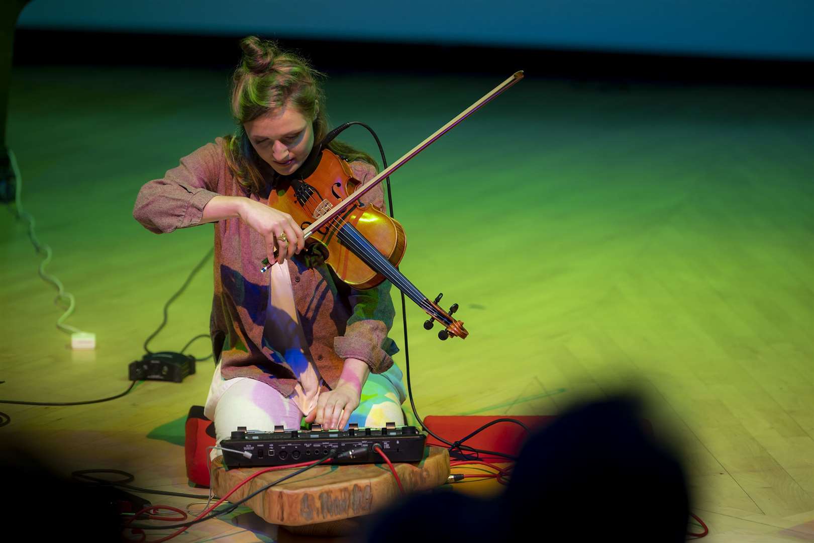 Carolin Waldmann performed an original song via violin and vocal loop. Picture by Mark Richards - Aurora Imaging.
