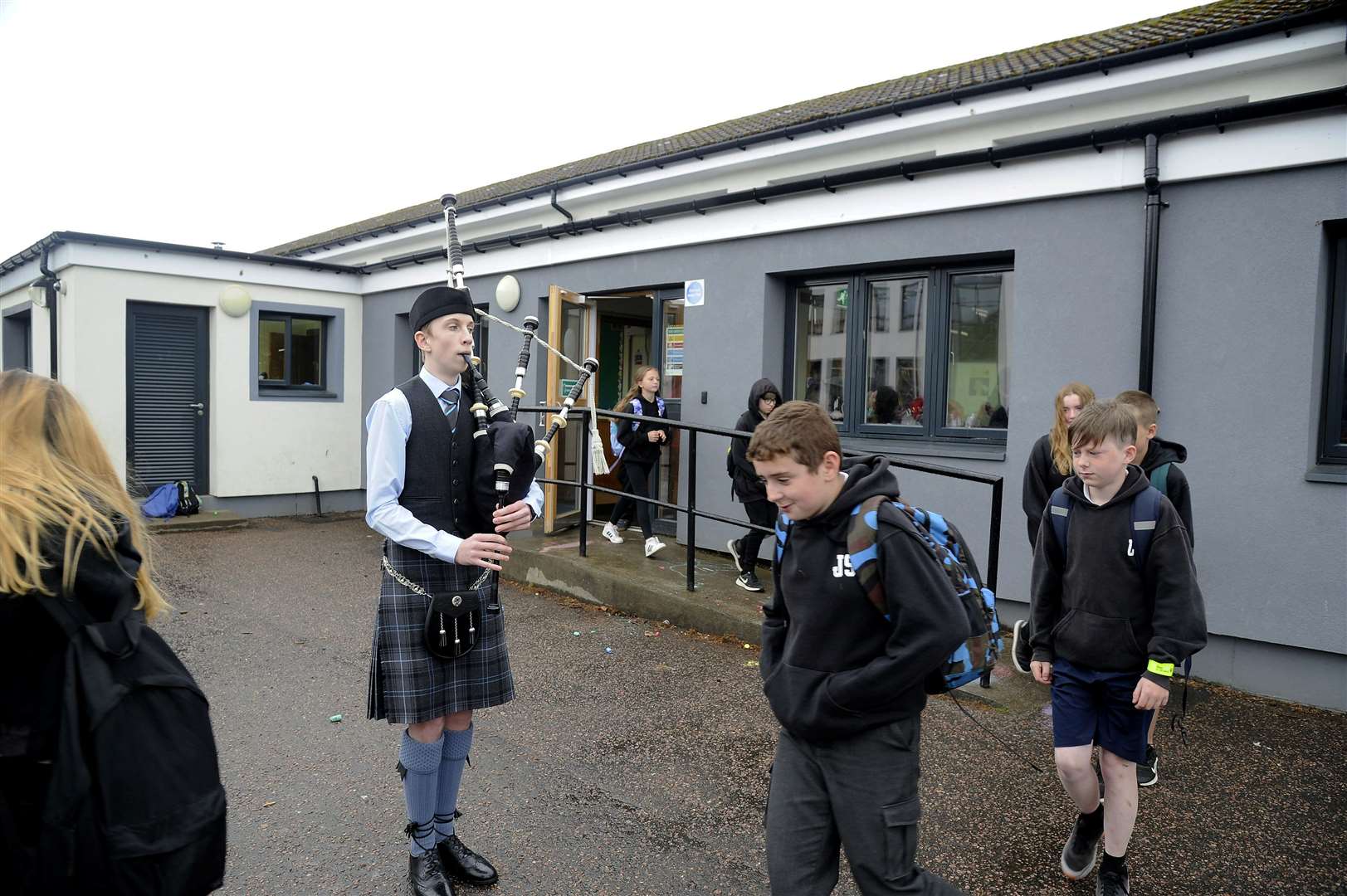 Applegrove leavers get piped out of school by ex pupil Aidan Phimister on their last day at the school...Picture: Becky Saunderson..