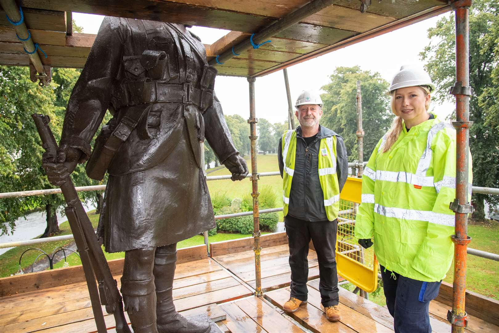 Moray Council's structural maintenance assistant Jez Allum (left) and Karolina reviewing her work. Picture: Daniel Forsyth