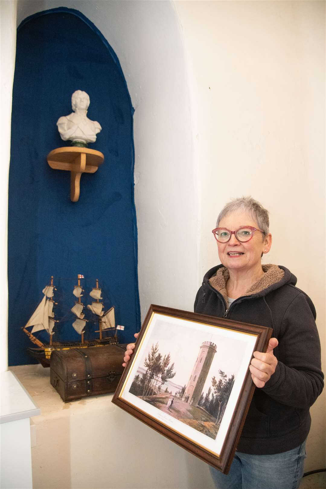 Ainsley James with a few of the artefacts on display in the tower.