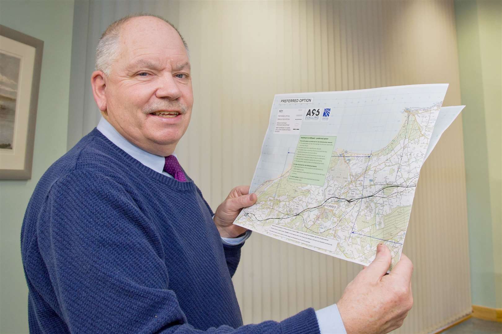 Alan James with a map of the preferred route north of Forres that he believes is the wrong option.
