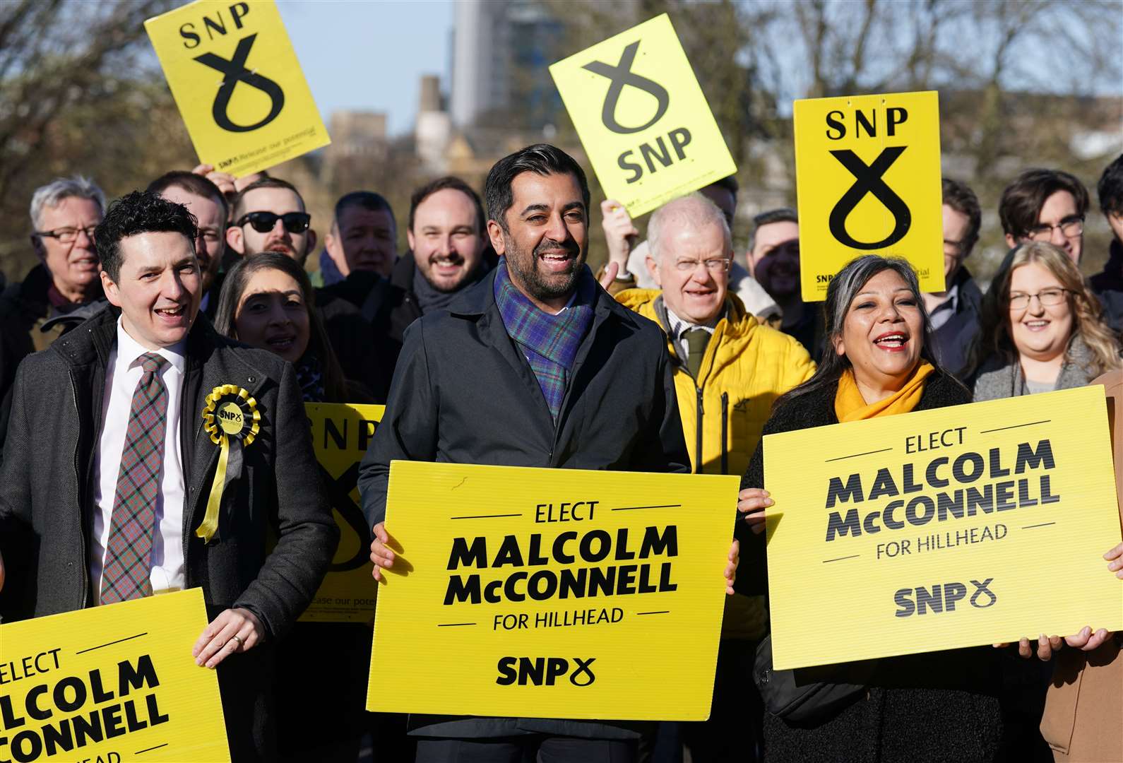First Minister Humza Yousaf with Westminster candidates, local Hillhead SNP by-election candidate Malcolm McConnell and activists in Kelvingrove Park, Glasgow (Andrew Milligan/PA Wire)