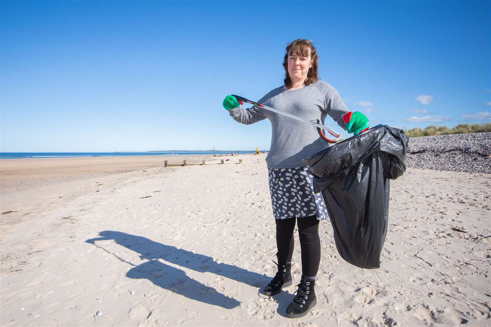 Sarah hopes more people will help comb the 100m stretch for rubbish.