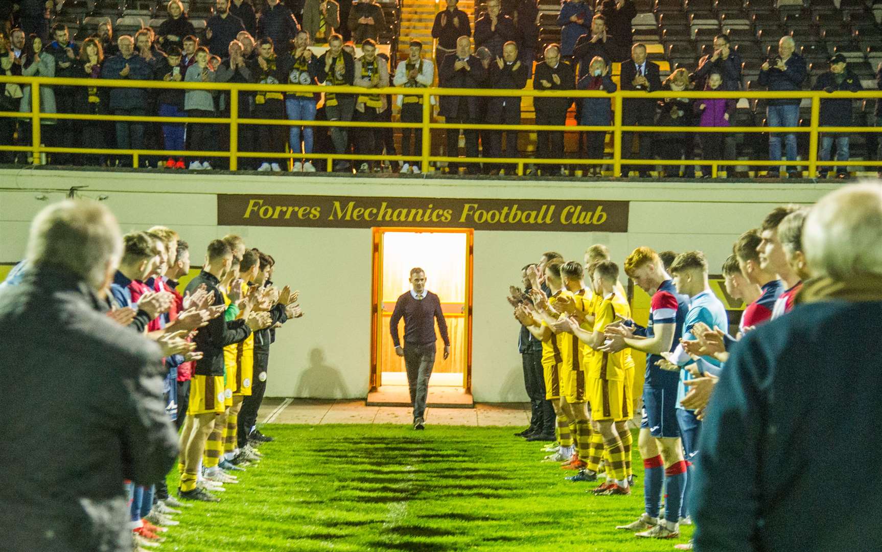 Charlie Rowley walks out and receives a guard of honour after his last game in charge of Forres Mechanic. Forres Mechanics v Turriff United at Mosset Park...Picture: Becky Saunderson..